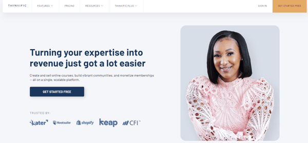 The webpage of Thinkific, with sign up buttons, description, a list of partners and the picture of a woman on the right side. The page is in blue and white, and the picture represents how to create an online course and an example of online course platform.